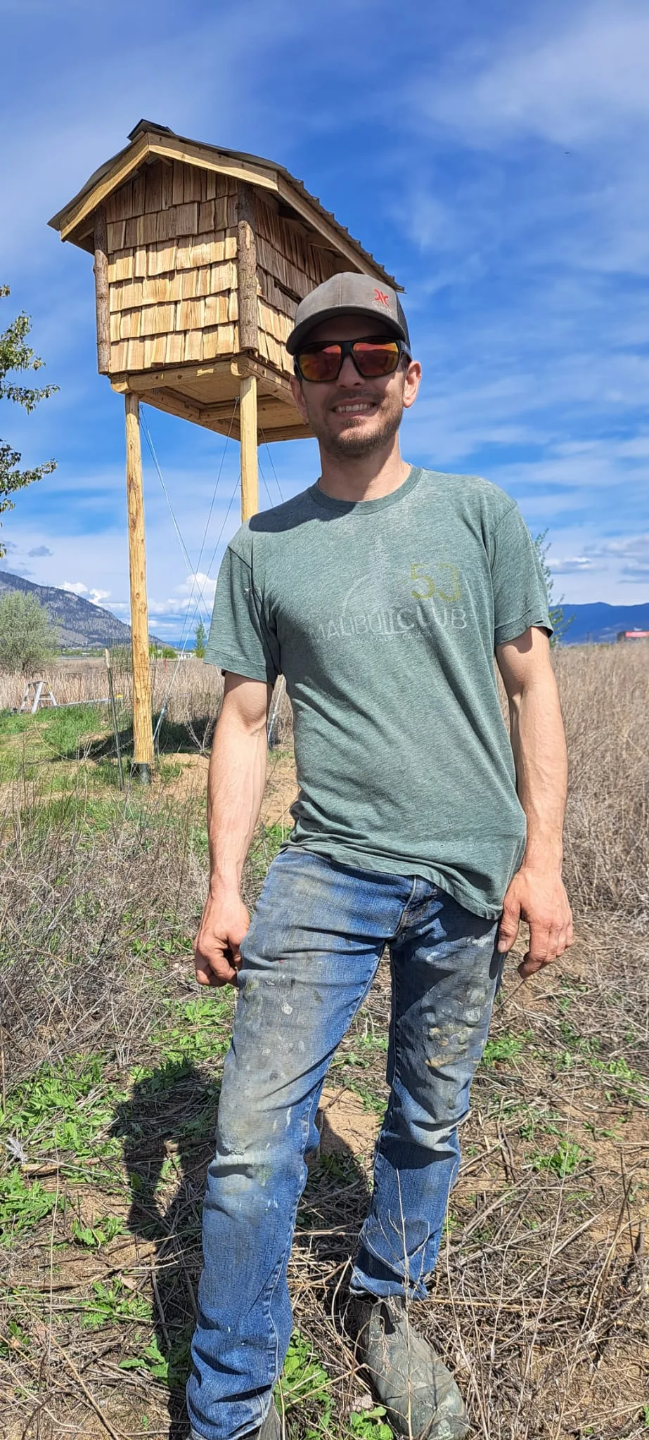 Liam Kinders in front of the completed Okanagan Bat Condo